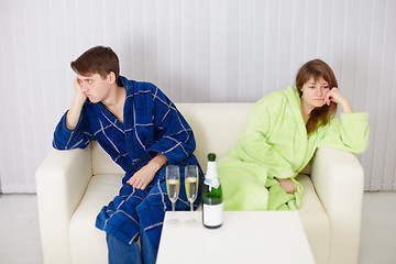 Image showing Quarrelled husband and wife at house on sofa
