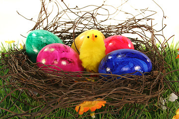 Image showing Easter basket with Easter eggs and chicks