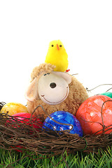 Image showing Easter basket with eggs, sheep and chicks