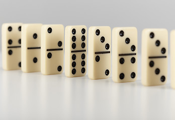 Image showing Dominoes line up