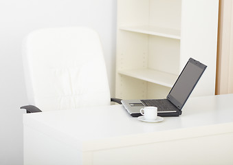 Image showing Office empty light workplace with laptop