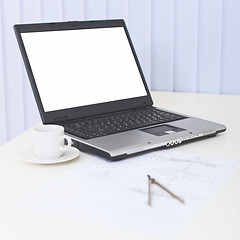 Image showing Business still-life - laptop on a table at office