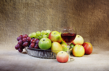 Image showing Classical still-life with fruit and glass