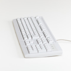 Image showing Computer keyboard lies on table surface