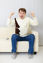 Image showing Man - football fan watches the championship on TV