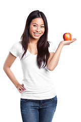 Image showing Asian woman holding apple