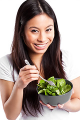 Image showing Asian woman eating salad