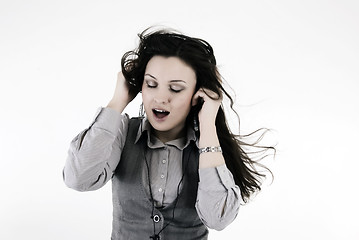 Image showing Young man in headphones   