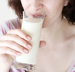 Image showing Young people eating milk with cereals