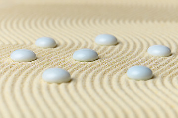 Image showing White drops on surface of yellow sand - abstract composition