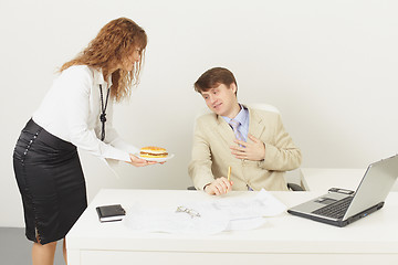 Image showing Young woman delivered to chief a sandwich to dinner