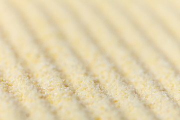 Image showing Japanese rock-garden - yellow sand close up