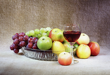 Image showing Classical still-life with fruit and wineglass