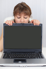 Image showing Woman and blank screen of laptop