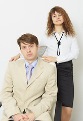 Image showing Serious man in jacket and tie and woman