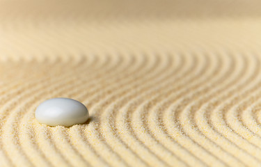 Image showing Sandy yellow background and glass stone - abstract composition