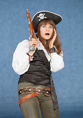 Image showing Strongly frightened woman in costume of sea pirate