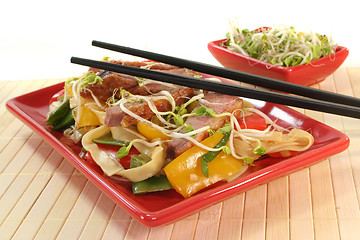 Image showing Duck breast with fried noodles