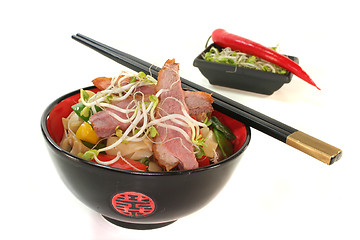 Image showing Duck breast with fried noodles