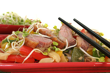 Image showing Duck breast with fried noodles