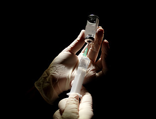 Image showing syringe that is being filled with vaccine