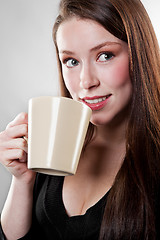 Image showing Businesswoman drinking coffee