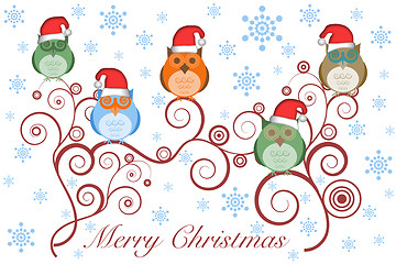 Image showing Christmas Owls with Santa Hat on Tree