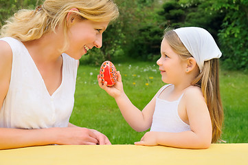 Image showing Young mother and daughter having Easter time