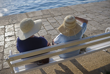 Image showing Two ladies with nice hats