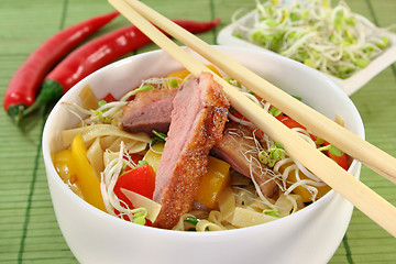 Image showing Duck breast with fried noodles