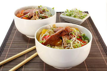 Image showing Duck breast with fried noodles