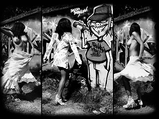 Image showing Topless dancer in front of a graffiti.