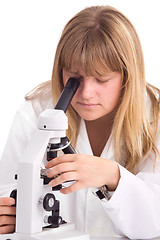 Image showing Woman in a laboratory with microscope