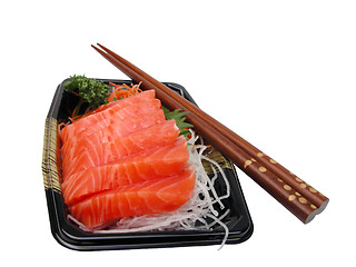 Image showing Salmon sashimi and chopsticks