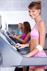 Image showing fit lady working out in gym