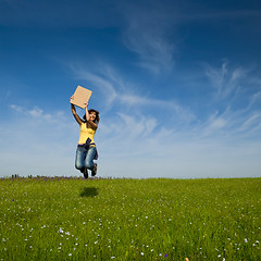 Image showing Girl with a paper card