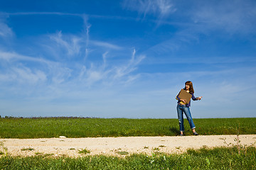 Image showing Hitch hiking girl