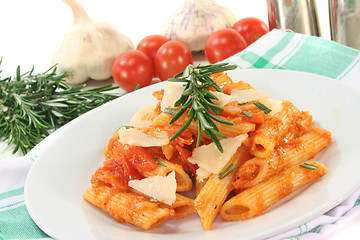 Image showing Penne with tomato sauce and Parmesan