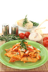 Image showing Penne with tomato sauce and Parmesan