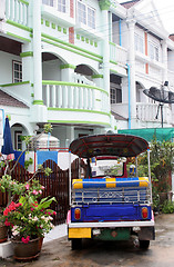 Image showing Vehicle parked outside a house