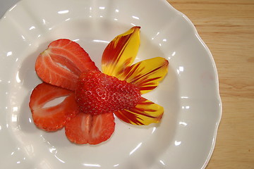 Image showing strawberry and tulip petals as a decoration