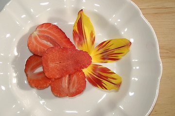 Image showing sliced strawberries on a plate