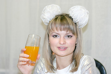 Image showing blonde to drink juice