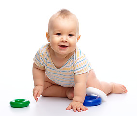 Image showing Little boy play with toys