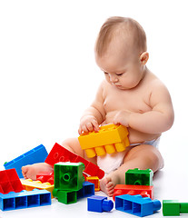 Image showing Little boy with building bricks