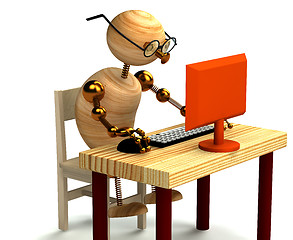 Image showing 3d wood man working at computer