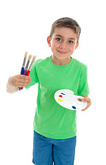 Image showing Boy with paintbrushes and artist palette