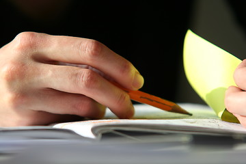 Image showing Hand with pencil