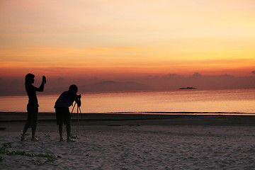 Image showing Photogaphing the sunrise