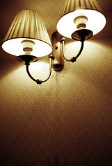 Image showing Photo of wall lamp with dim light   